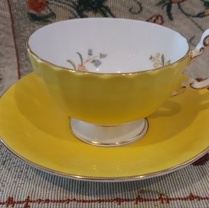 AYNSLEY bright yellow and floral teacup and saucer